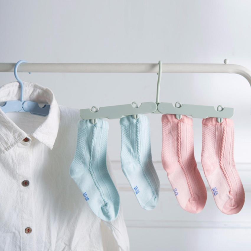 4 Pcs/1 Set Lucu Plastik Gantungan Baju Lipat Portable Travel Mantel Gantungan Rak dengan